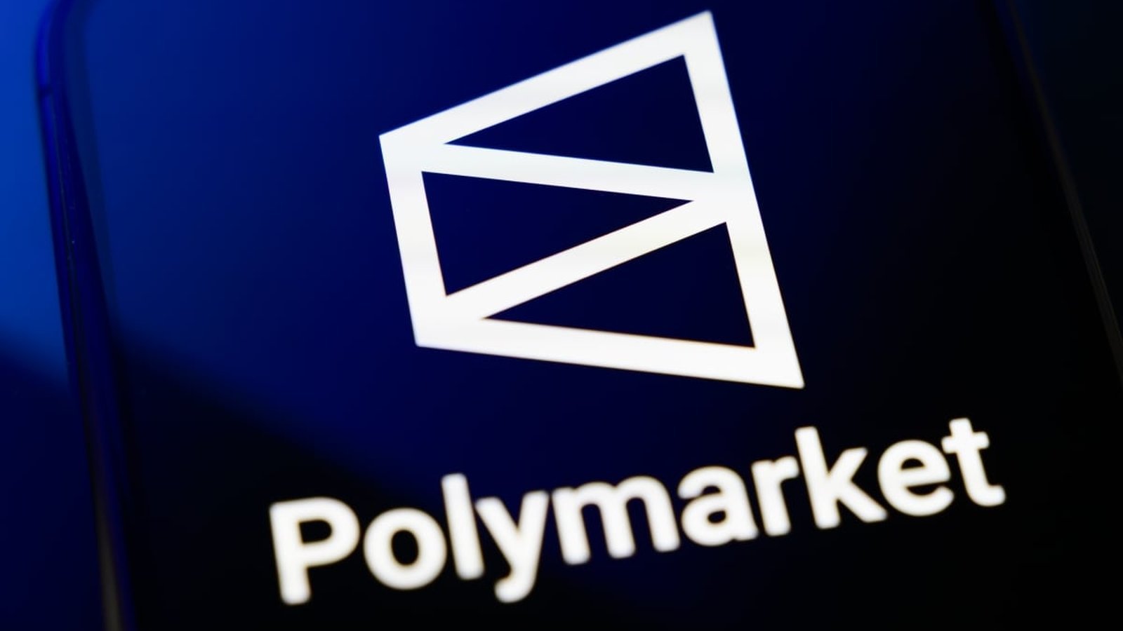Polymarket logo application sur écran de téléphone mobile