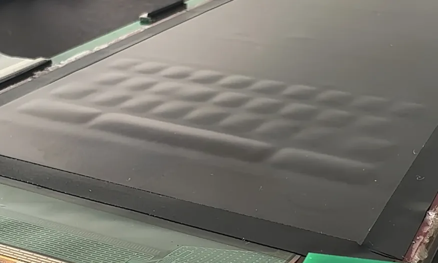 retour haptique sur clavier oled