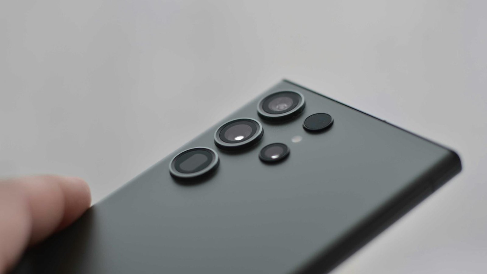 Detailed close-up of smartphone camera lenses, ideal for tech visuals.