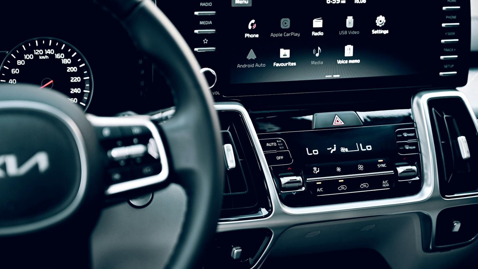 Apple CarPlay sur écran central tableau de bord Kia