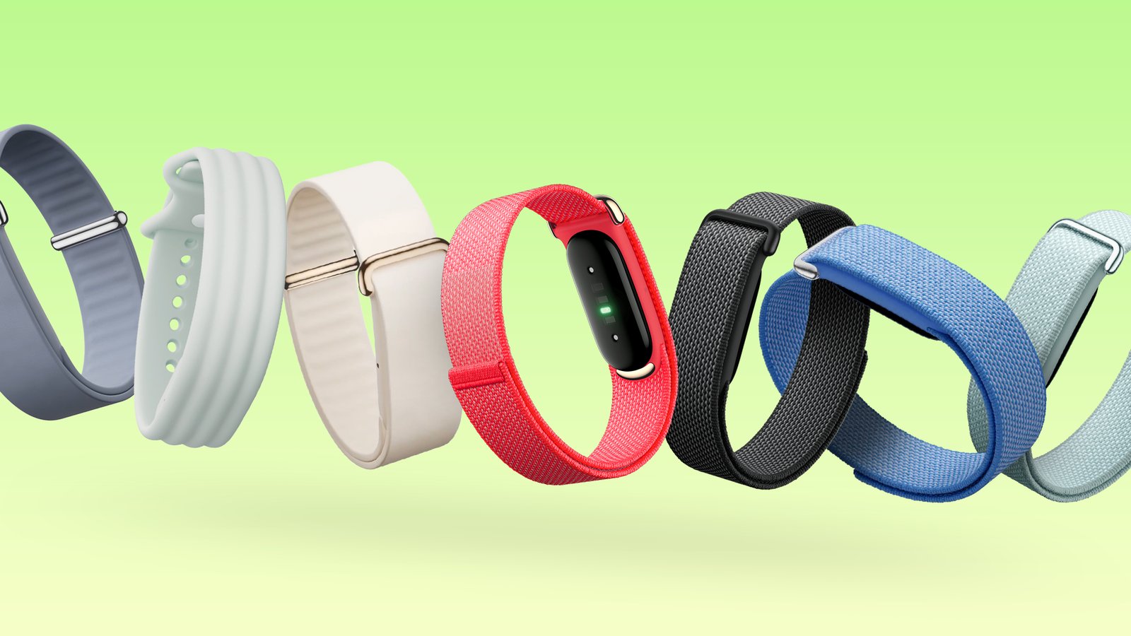 Fitbit bracelets multicolores collection variée sur fond vert