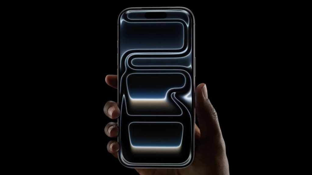 iPhone Pro tenu en main avec animation graphique sur l'écran fond noir