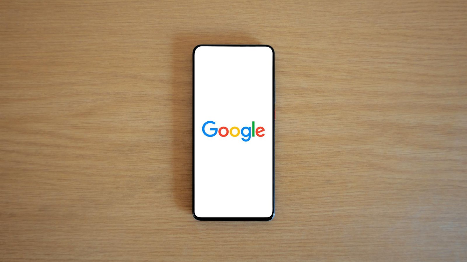 Google Pixel 11 logo Google sur écran smartphone fond blanc
