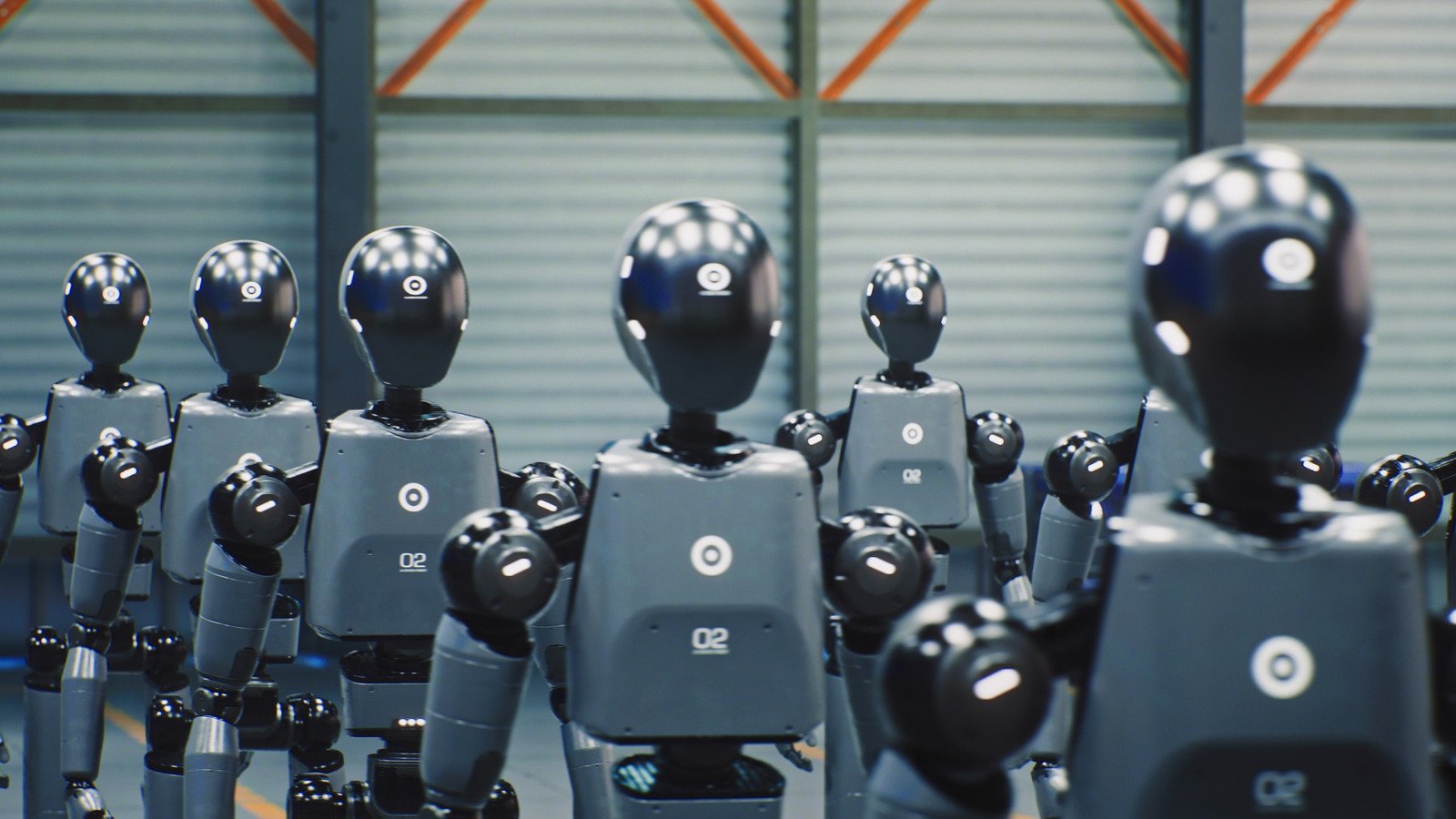 Robots humanoïdes en série dans un entrepôt industriel