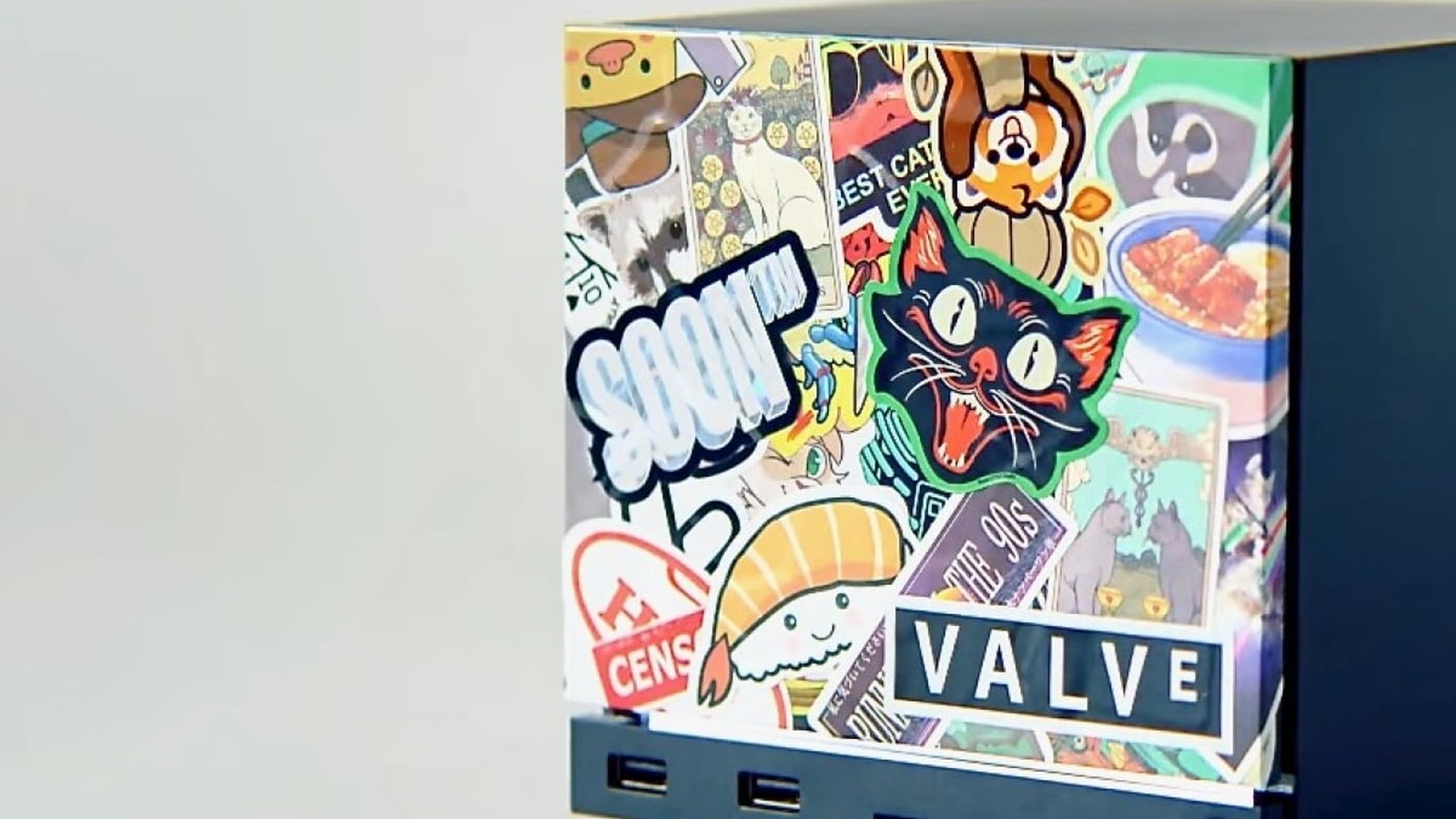 Steam Machine Valve vue latérale avec connecteurs et panneau stickers